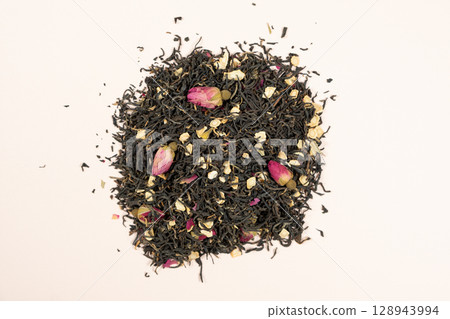 Loose Black Tea with Ginseng and Rose Petals Macro Top View 128943994