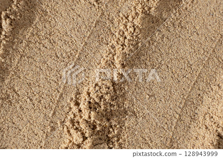 Flaxseed Flour Macro Texture Top View. Culinary Background Flaxseed Flour Macro Texture Top View. Culinary Background 128943999