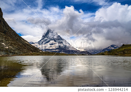Matterhorn Reflected in Riffelsee Lake, Swiss Alps 128944214