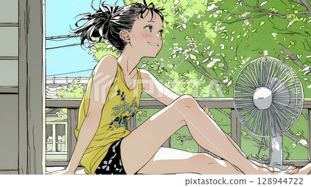 A young woman cooling off with a fan on a hot summer afternoon 128944722