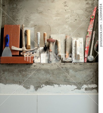 Construction mason cement mortar tools 128944954