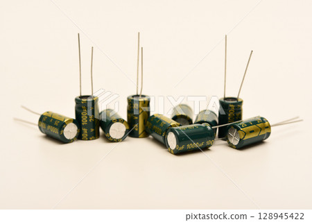Electrolytic capacitors of different nominal values. Energy storage devices. Electronic radio elements. 128945422