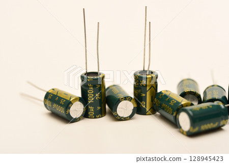 Electrolytic capacitors of different nominal values. Energy storage devices. Electronic radio elements. 128945423
