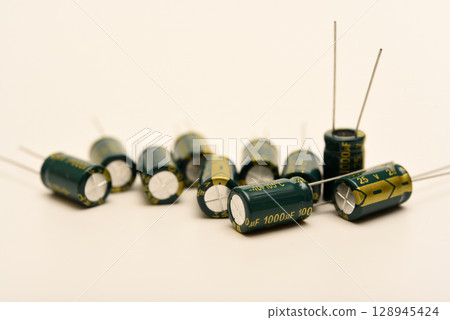Electrolytic capacitors of different nominal values. Energy storage devices. Electronic radio elements. 128945424