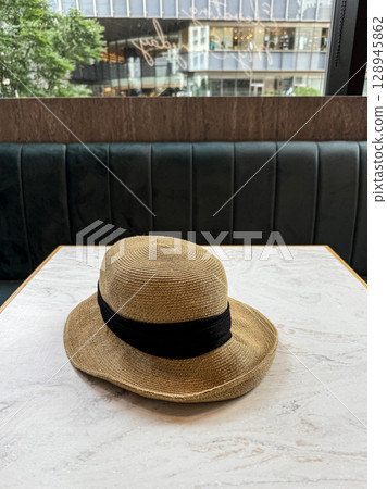 Hat and table 128945862