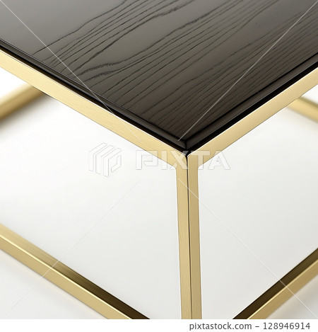 A black and gold table with a wooden top 128946914