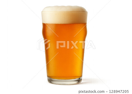 Golden Beer in a Tall Glass With Frothy Head on Display in a Casual Setting 128947205