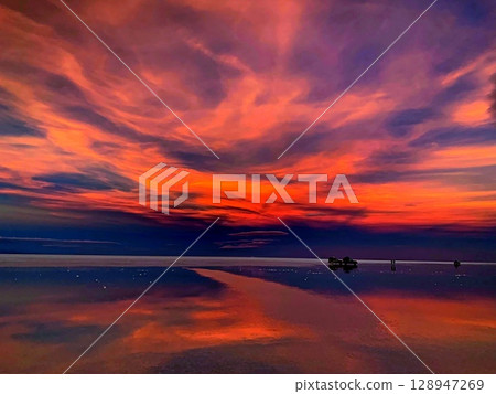 Fantastic sunset sky over sea Fantastic sunset sky over sea 128947269
