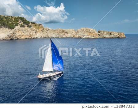 Aerial view of beautiful sailboat. Boat on the sea in summer 128947338