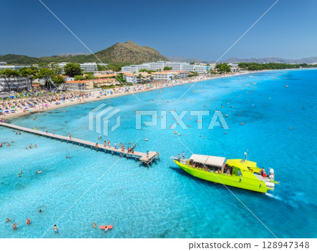 Aerial view of Alcudia beach, blue sea, white sandy beach 128947348