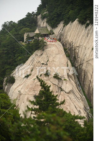 Canglong Temple is a Taoist temple located on Mount Huashan. It is a significant religious site and a popular tourist attraction. The temple is known for its history and cultural significance. Canglong Temple is a Taoist temple located on Mount Huashan. It is a significant religious site and a popular tourist attraction. The temple is known for its history and cultural significance. 128948222