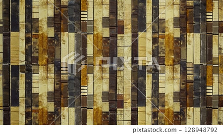 A vintageinspired pattern featuring rows of grainy rectangles in varying shades of browns and yellows creating the illusion of a classic film reel 128948792