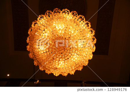 Light from luxury lamp ceiling in the hotel room. 128949176