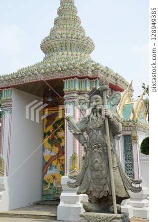 Chinese guardian statue at the gate of Wat Pho Which is one of the largest and oldest temples in Bangkok and is popular with both Thai and foreign tourists. Chinese guardian statue at the gate of Wat Pho Which is one of the largest and oldest temples in Bangkok and is popular with both Thai and foreign tourists. 128949385