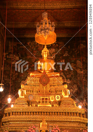 Phra Phuttha Thewapatimakorn is the principal Buddha image in the ordination hall of Wat Phra Chetuphon Wimonmangklaram or Wat Pho is popular with both tourists. 128949894