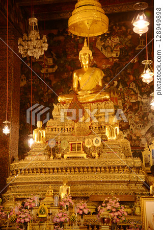Phra Phuttha Thewapatimakorn is the principal Buddha image in the ordination hall of Wat Phra Chetuphon Wimonmangklaram or Wat Pho is popular with both tourists. Phra Phuttha Thewapatimakorn is the principal Buddha image in the ordination hall of Wat Phra Chetuphon Wimonmangklaram or Wat Pho is popular with both tourists. 128949898