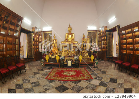 The golden sitting Buddha statue is made of bronze and is enshrined in Wat Phra Chetuphon Wimonmangklaram or Wat Pho is popular with both Thai and foreign tourists. The golden sitting Buddha statue is made of bronze and is enshrined in Wat Phra Chetuphon Wimonmangklaram or Wat Pho is popular with both Thai and foreign tourists. 128949904