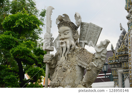 Chinese guardian statue at the gate of Wat Pho Which is one of the largest and oldest temples in Bangkok and is popular with both Thai and foreign tourists. Chinese guardian statue at the gate of Wat Pho Which is one of the largest and oldest temples in Bangkok and is popular with both Thai and foreign tourists. 128950146