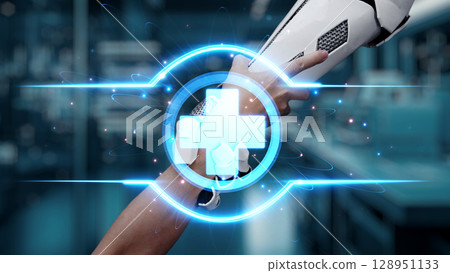 Close up of hand reaching and holding robotic arm with cross icon. Salubrious. 128951133