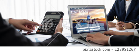 Analyst team working on data analysis dashboard on laptop screen. Insight 128951267