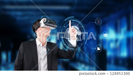 Innovating the Future: A Business Professional Engaged in Virtual Reality Technology with AI Holographic Interface in a High-Tech Environment XDMCP 128951300