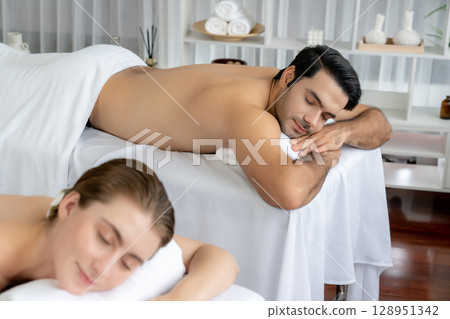 Caucasian couple customer enjoying relaxing anti-stress massage. Quiescent 128951342