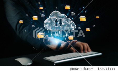 Hand Reaching for Cloud Storage with Digital Files and Folders Representing Data Transfer and Technology Innovation Concept in Dark Background. Qubit 128951344