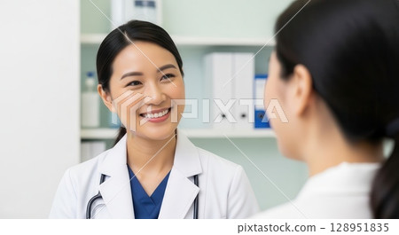 Friendly Doctor Engaging with Patient in Medical Office - AI-generated 128951835