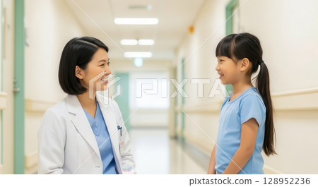 Doctor and Child Smiling in Hospital Corridor - AI-generated image 128952236