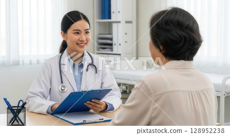 Doctor Consulting with Patient in Modern Clinic - AI-generated image 128952238