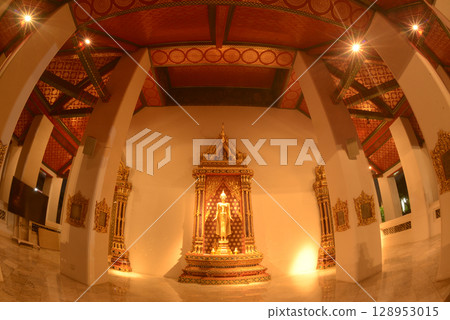 The standing Buddha statue is made of bronze and is enshrined in Wat Phra Chetuphon Wimonmangklaram or Wat Pho is popular with both Thai and foreign tourists. Located at Bangkok city in Thailand. The standing Buddha statue is made of bronze and is enshrined in Wat Phra Chetuphon Wimonmangklaram or Wat Pho is popular with both Thai and foreign tourists. Located at Bangkok city in Thailand. 128953015