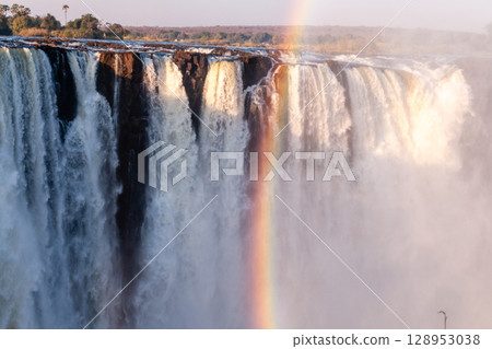 A rainbow in front of victoria falls 128953038