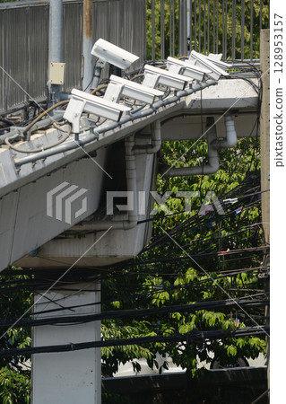 CCTV on the overpass in the down town of Bangkok capital city in Thailand. CCTV on the overpass in the down town of Bangkok capital city in Thailand. 128953157
