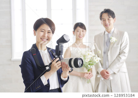 Bridal photographer portrait looking at camera 128953184