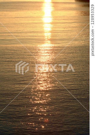 Sunrise light shining on the sea 128953329