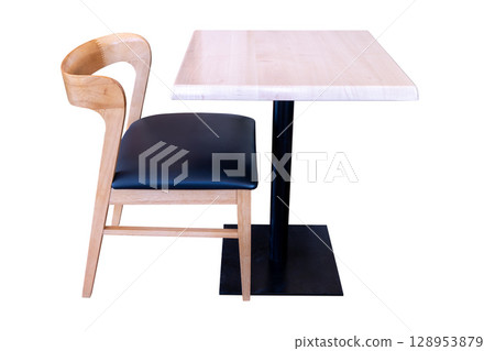 Modern dining table with steel legs and chair with  leather cushion isolated 128953879