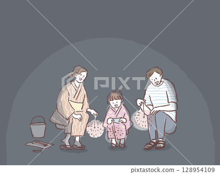 Family playing sparklers 128954109