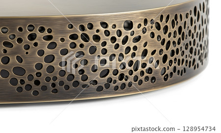 A piece of furniture with a gold finish and a pattern of holes 128954734