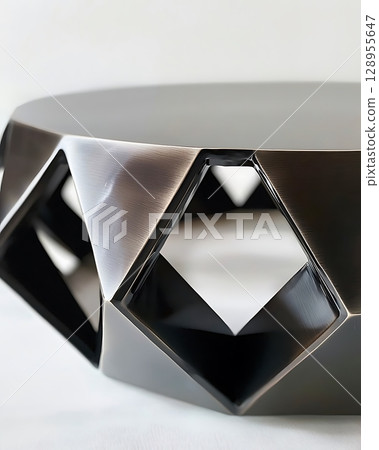 A black and silver table with diamond shaped holes 128955647