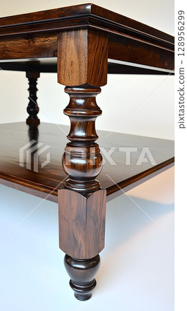 Wooden table with a brown top and legs 128956299