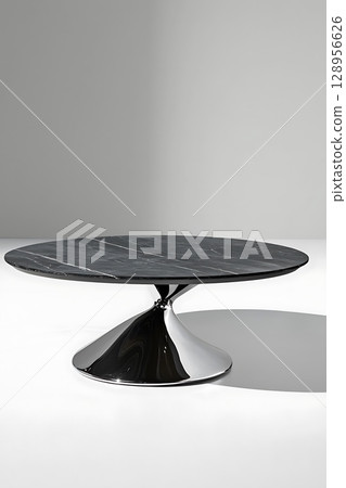 Black table with a silver base and a silver top 128956626