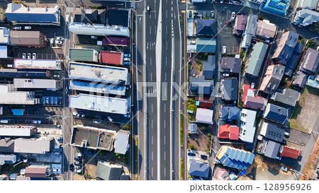 Drone aerial view of modern city and roads 128956926