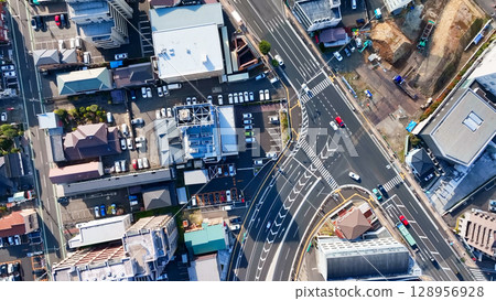 Drone aerial view of modern city and roads 128956928