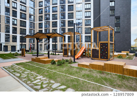 A Modern Playground in an Urban Residential Complex for Fun Activities and Adventure 128957809