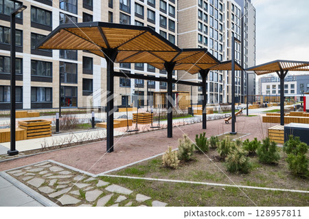 A modern urban landscape featuring stylish and functional canopies enhancing the scenery 128957811