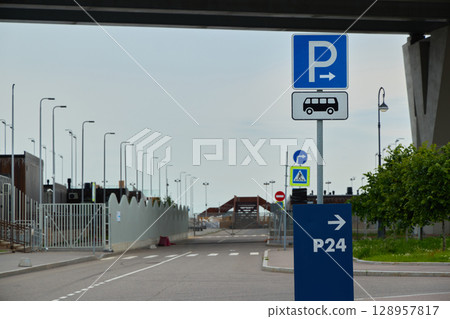 Designated Parking Area Equipped with Clear Bus Stop Signage for Enhanced Accessibility Designated Parking Area Equipped with Clear Bus Stop Signage for Enhanced Accessibility 128957817