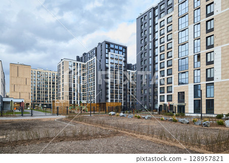 This is a modern urban residential complex that showcases striking contemporary architecture 128957821