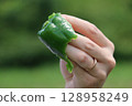 Water dripping from freshly picked peppers 128958249