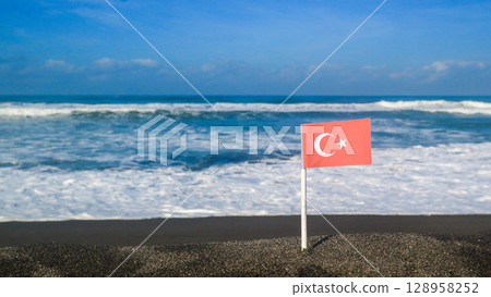 Turkish flag on the beach. Travel destination summer Turkish flag on the beach. Travel destination summer 128958252