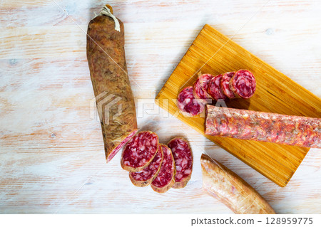 Spanish dry cured pork sausage Salchichon 128959775